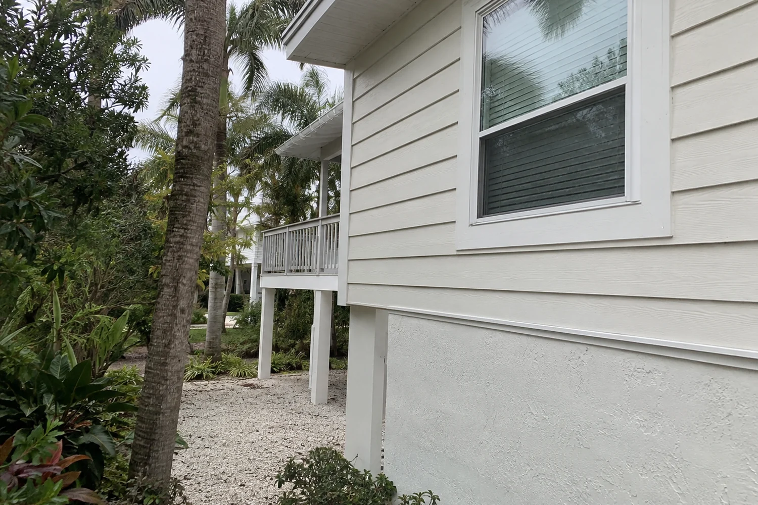 Sanibel residential window and exterior in a modest island home setting