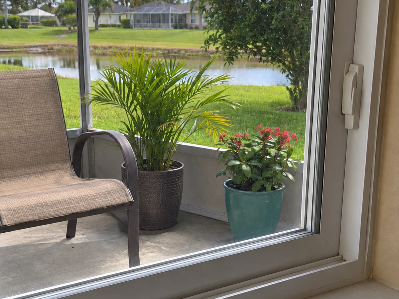 The same residential window after ordinary film and water marks have been cleaned away